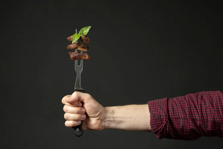 front-view-hand-holding-food-fork_23-2148510927.webp