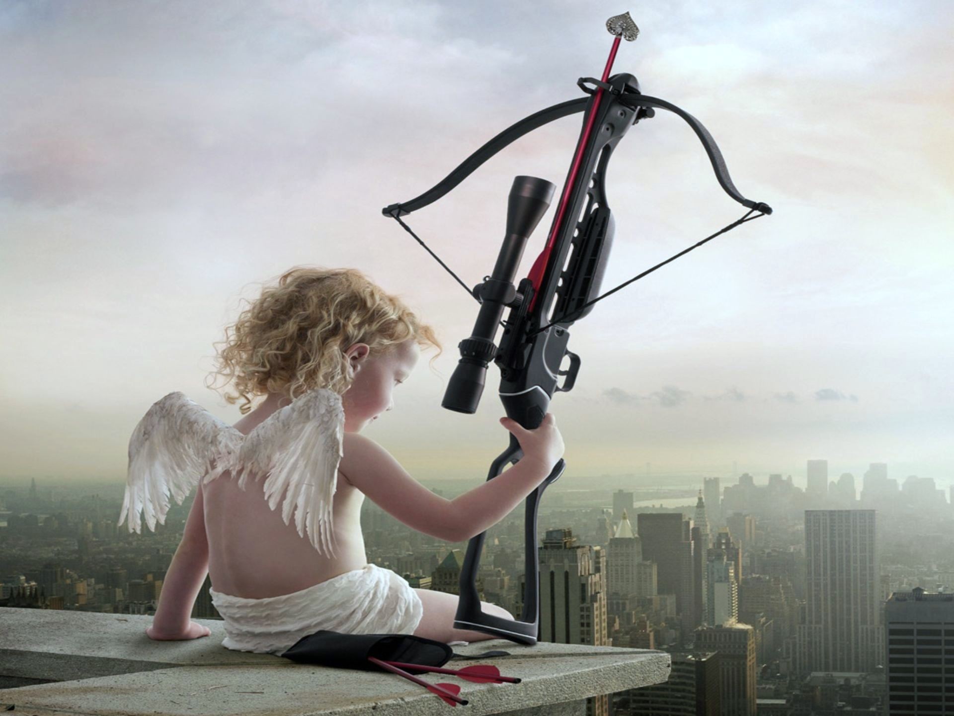 Funny_wallpapers_Cupid_is_sitting_on_the_roof_067807_.jpg