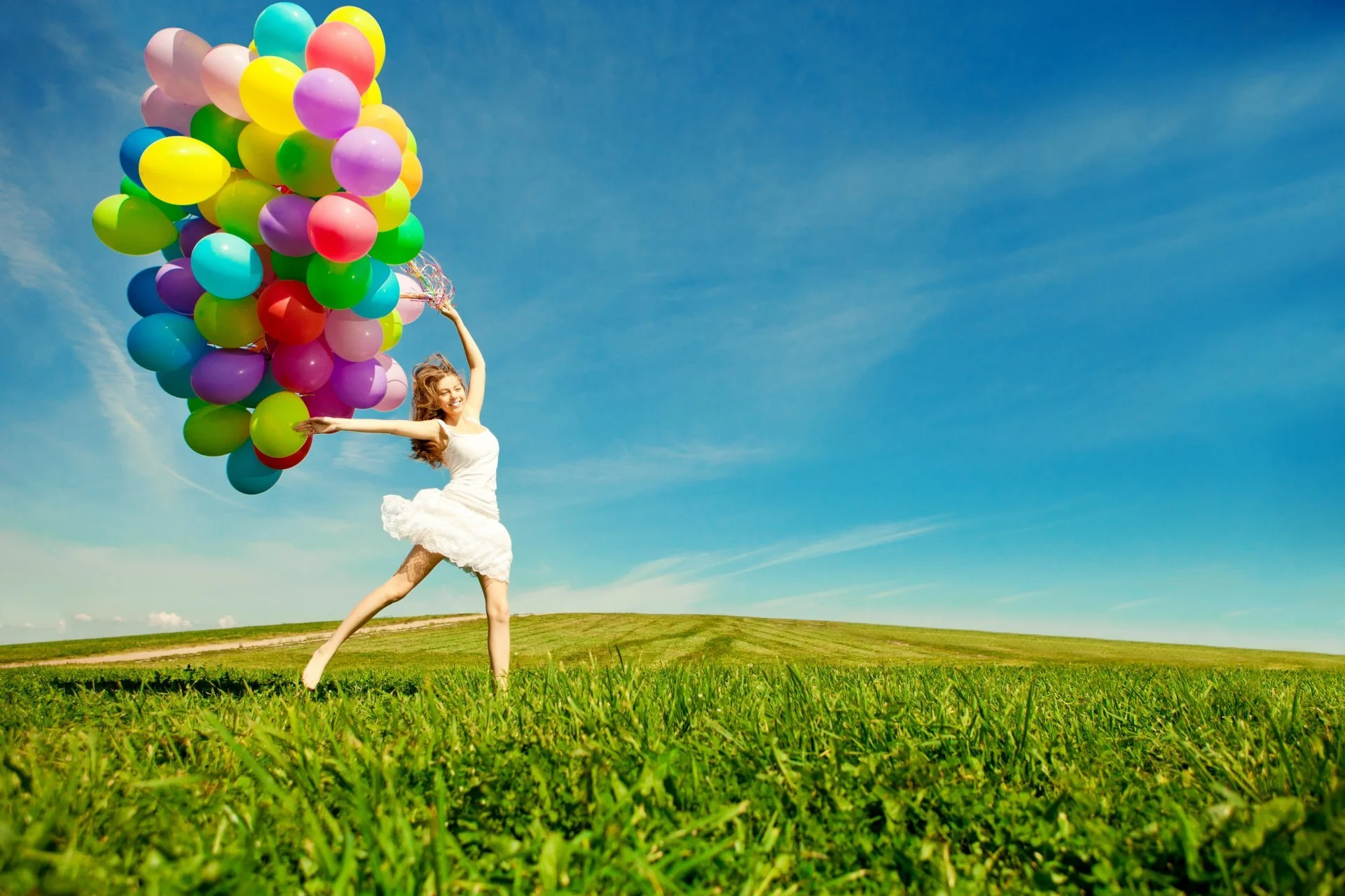 girl-happiness-jump-balloons.webp