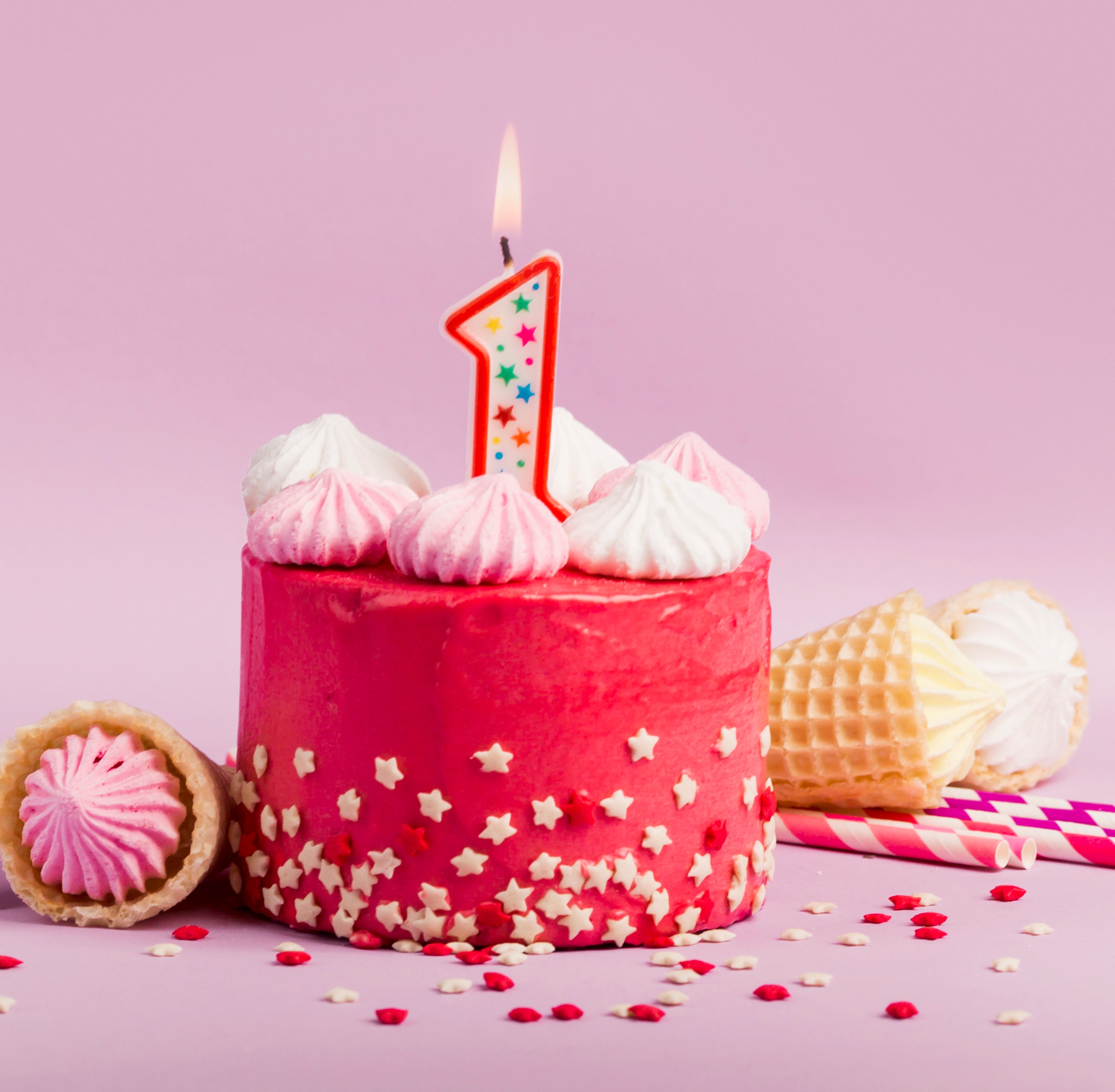 happy-birthday-card-near-cake-with-lighted-candles-gift-box-purple-backdrop.jpg