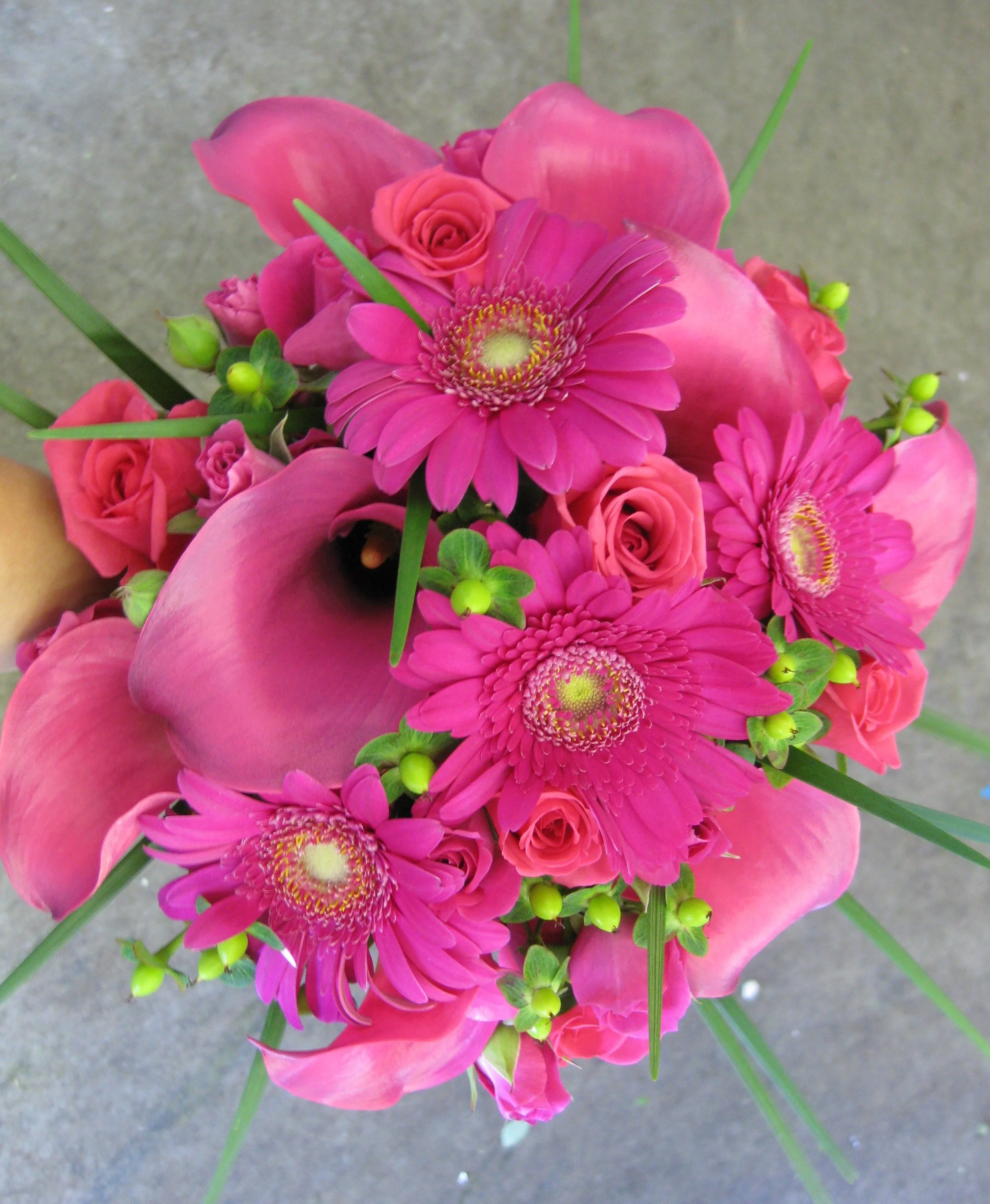 hot-pink-roses-and-mini-calla-lilies.webp