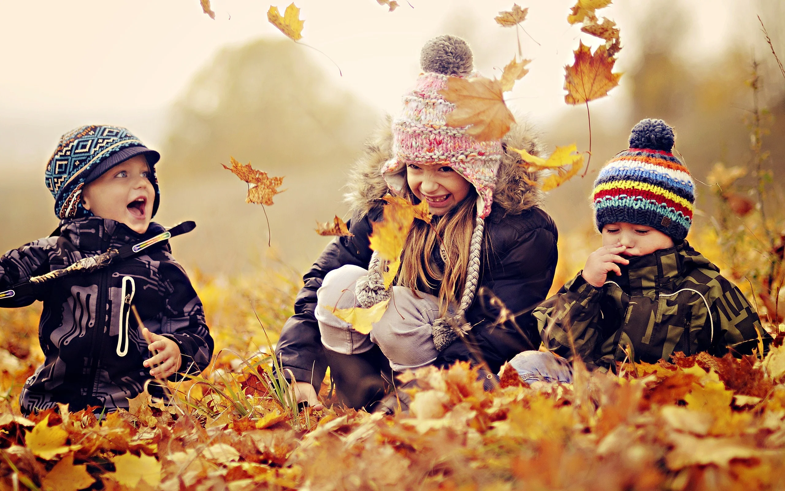 kids-in-leaves.webp