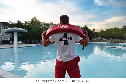 lifeguard-having-fun-pool-while-260nw-1382167541.jpg