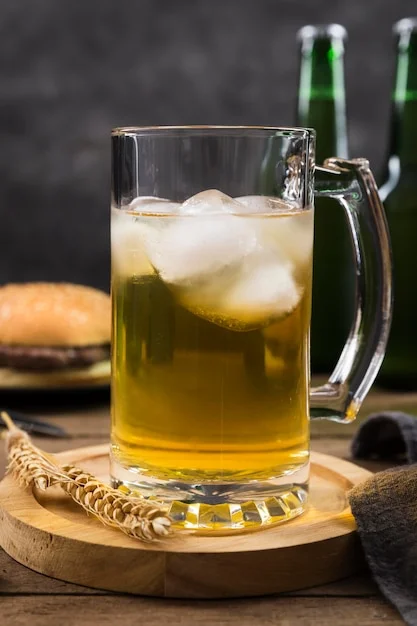mug-with-beer-hamburger-beside_23-2148600921.webp