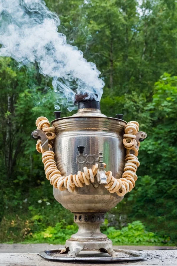 samovar-boils-nature-traditional-old-russian-tea-kettle-boiling-75558032.webp