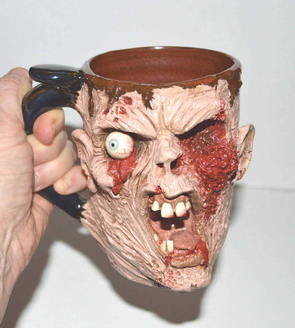 scravis_grotesque_alien_monster_coffee_mugs_7.webp