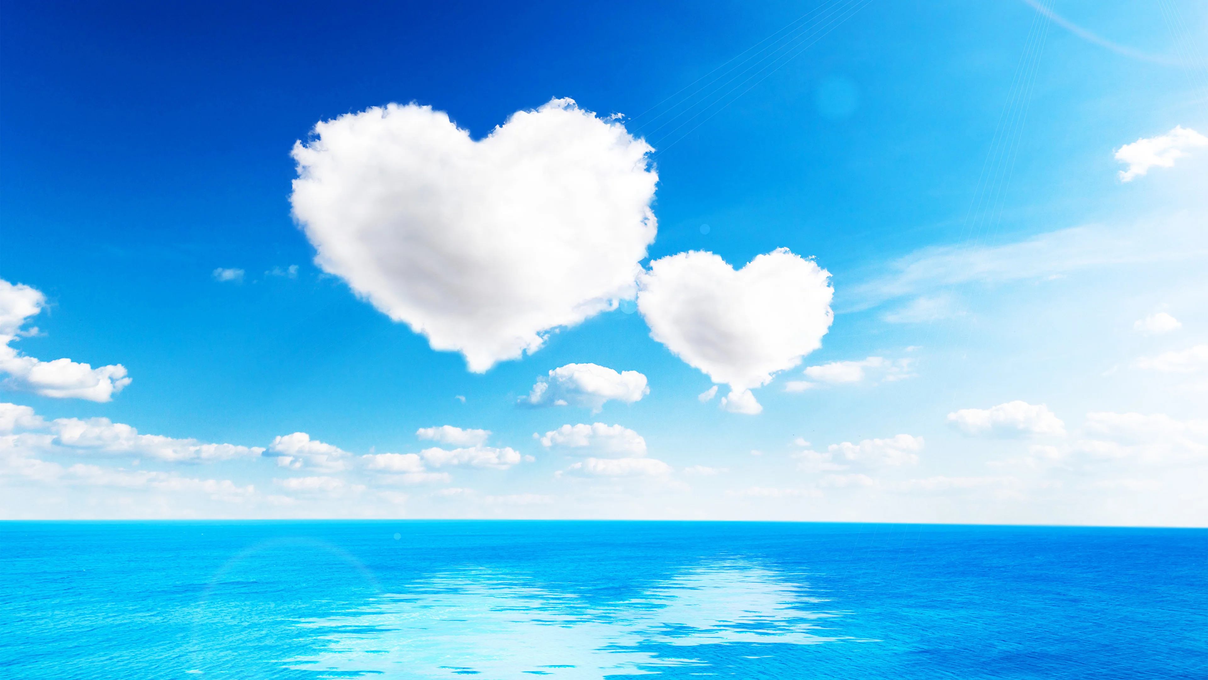 Sea_Sky_Clouds_Heart_Horizon_512808_3840x2160.webp