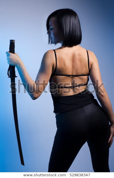 sexy-girl-holding-samurai-sword-600w-529838347.jpg