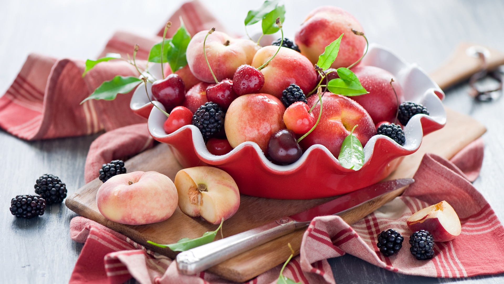 Still-life-fruit-peaches-cherries-blackberry-wood-board-knife_1920x1080.jpg