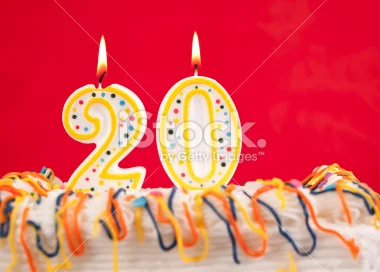 stock-photo-11851886-decorated-cake-with-number-20-candles-red-background.webp