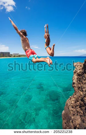 stock-photo-summer-fun-friends-cliff-jumping-into-the-ocean-205221238.webp