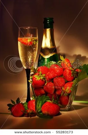 stock_photo_romantic_still_life_of_champagne_and_fresh_strawberries_55283173.webp