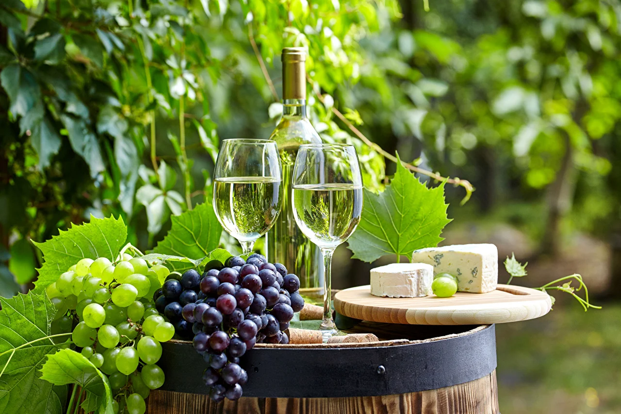 Wine_Grapes_Cheese_Bottle_Stemware_Two_534515_1280x853.webp