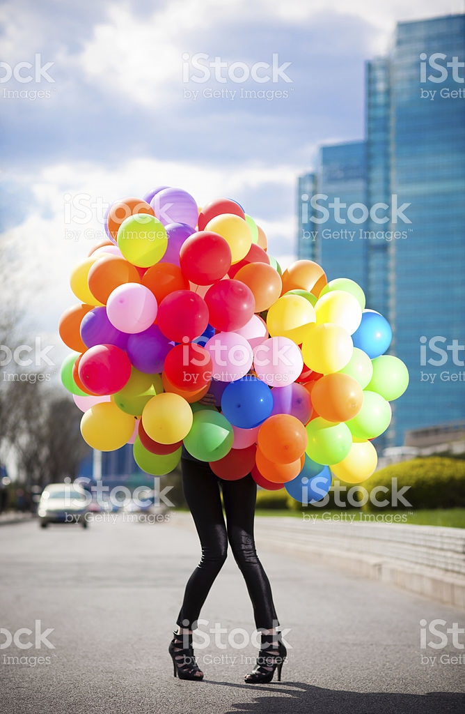 woman-holding-many-balloons-picture-id117148461.jpg