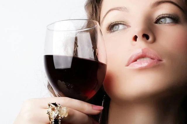woman-with-wine.webp