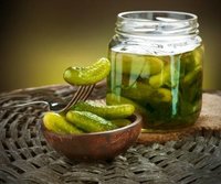 14193415-gherkins-pickles-salted-cucumbers-still-life.jpg