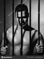 depositphotos_165797602-stock-photo-sexy-man-behind-bars.jpg