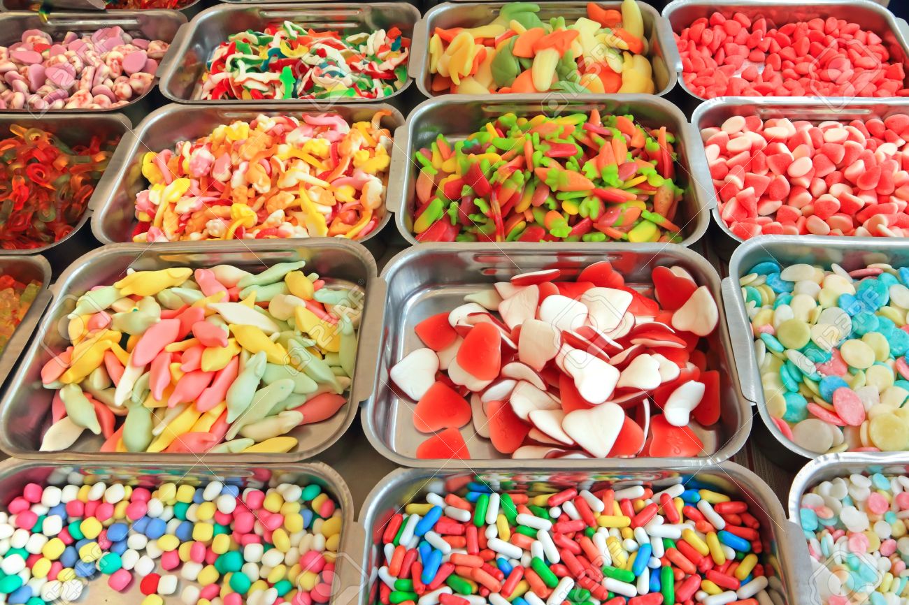 10467655-Background-made-of-colourful-sweets-and-candies-Stock-Photo-candy-shop.jpg