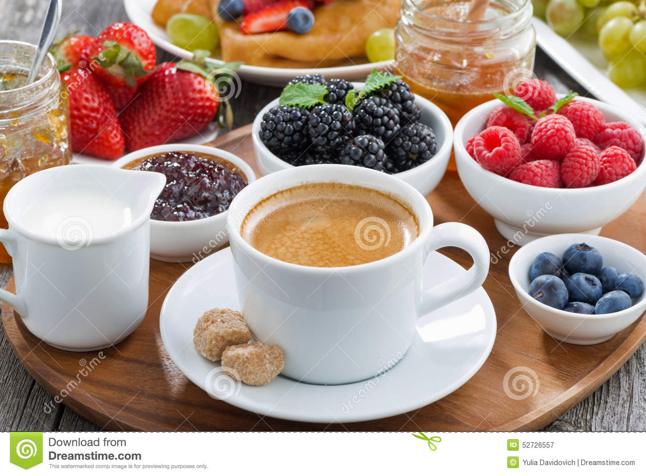 delicious-breakfast-coffee-fresh-berries-pancakes-horizontal-52726557.jpg
