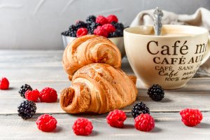 2020Food___Cakes_and_Sweet_Two_croissants_on_a_table_with_a_cup_of_coffee_and_berries_143362_.jpg